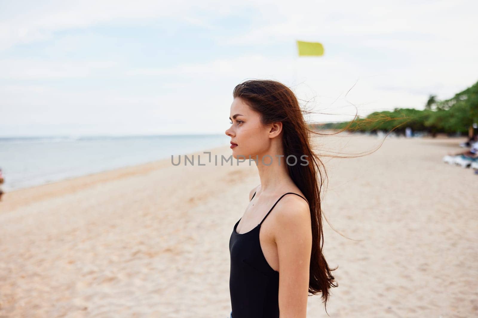 woman carefree smile vacation nature young sand ocean beach sea summer by SHOTPRIME