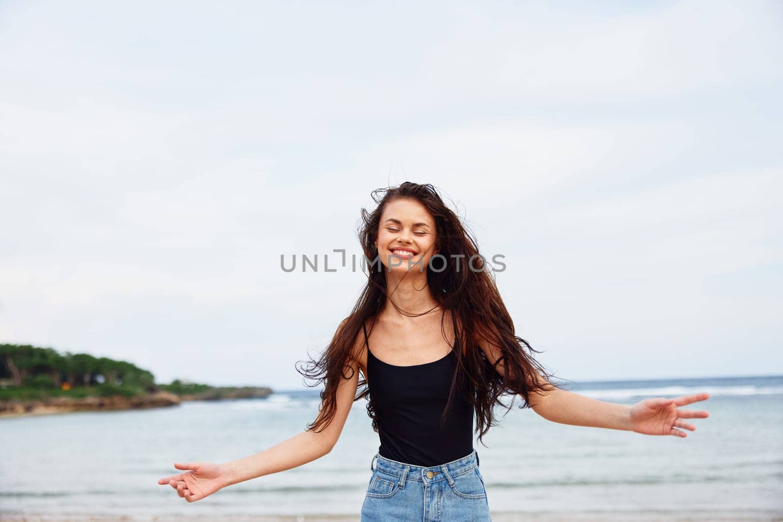 woman space sunset summer positive sea carefree female travel sand flight hair long copy body running activity young leisure smile beach lifestyle water