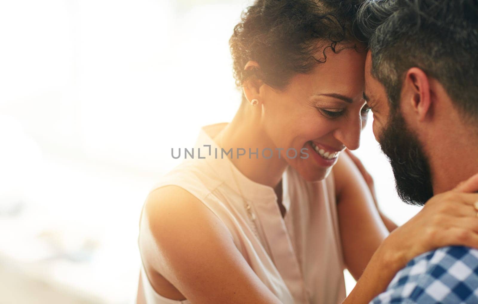 Love, hug and face of couple with lens flare for commitment, embrace and trust outdoors. Marriage, mockup space and happy man and woman smile for romance on holiday, vacation and happiness together by YuriArcurs