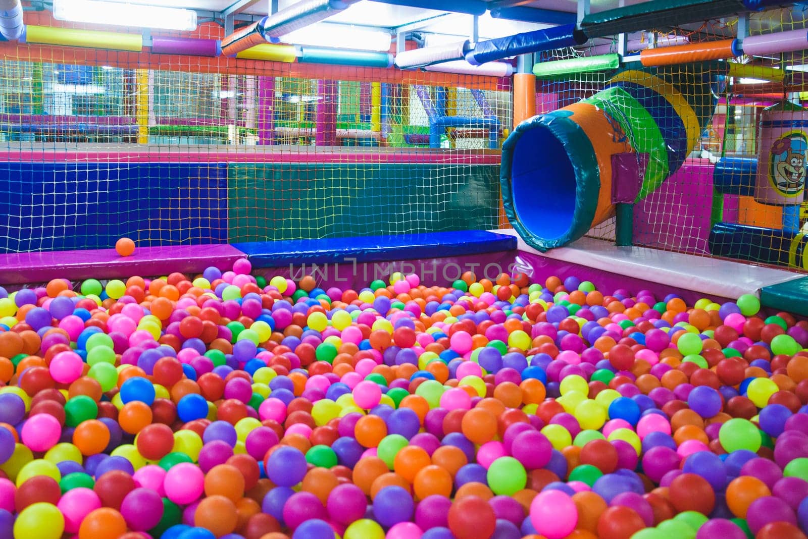 Indoor playground with colorful plastic balls for children by jcdiazhidalgo