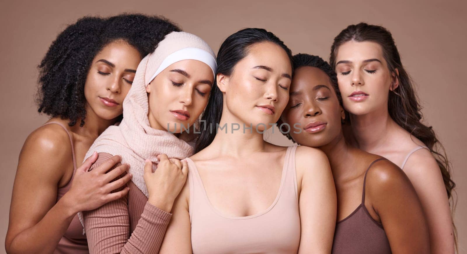 Women, diversity and relax global model group feeling calm about skincare, beauty and skin glow. Cosmetic, facial and dermatology wellness of models resting together showing cosmetics community.