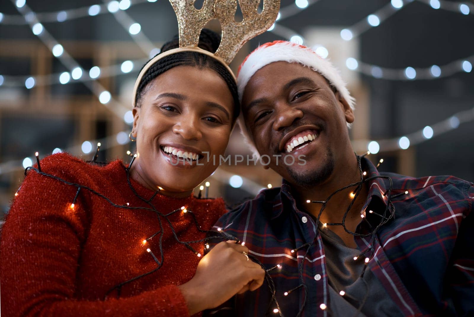 Black couple, Christmas and portrait smile for happy relationship bonding during festive season in the outdoors. Man and woman hug, smiling and enjoying quality time in celebration with city lights.