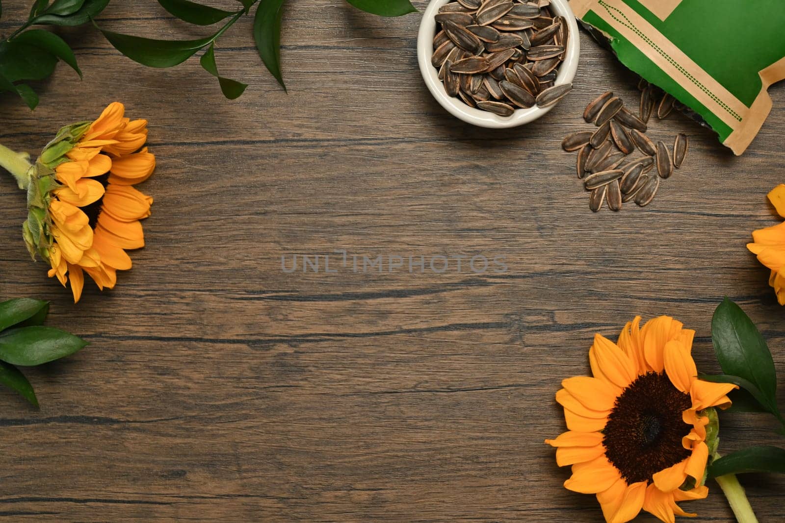 Top view of roasted sunflower seeds on rustic vintage table. Bio and organic product and vegan food concept.