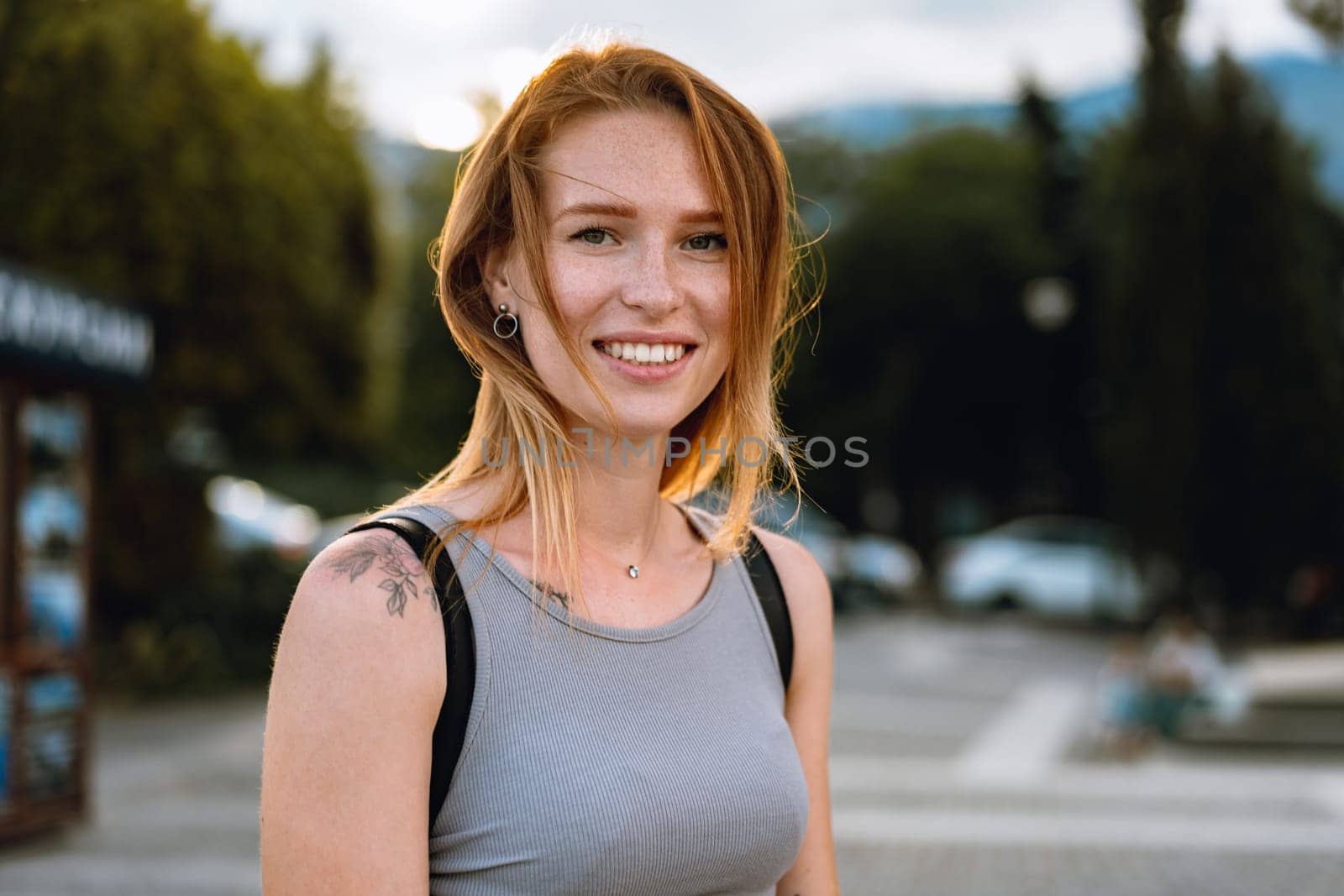 Portrait of a beautiful young woman outdoors by Fabrikasimf