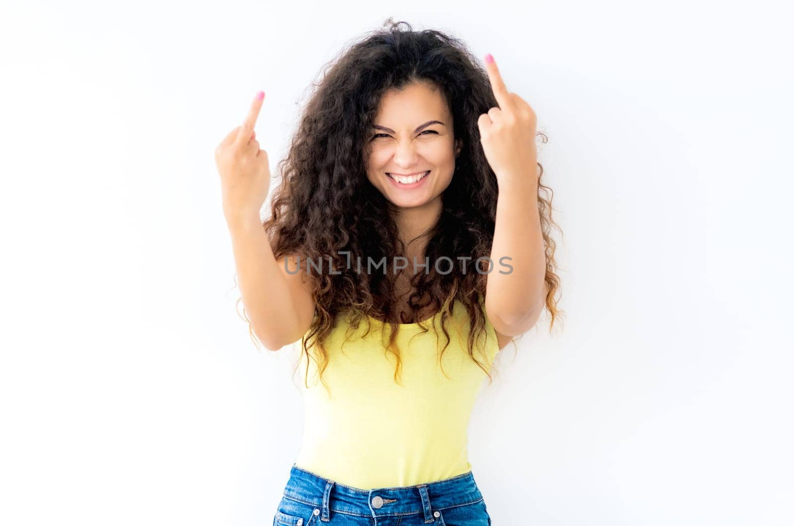 Gorgeous young girl showing middle fingers