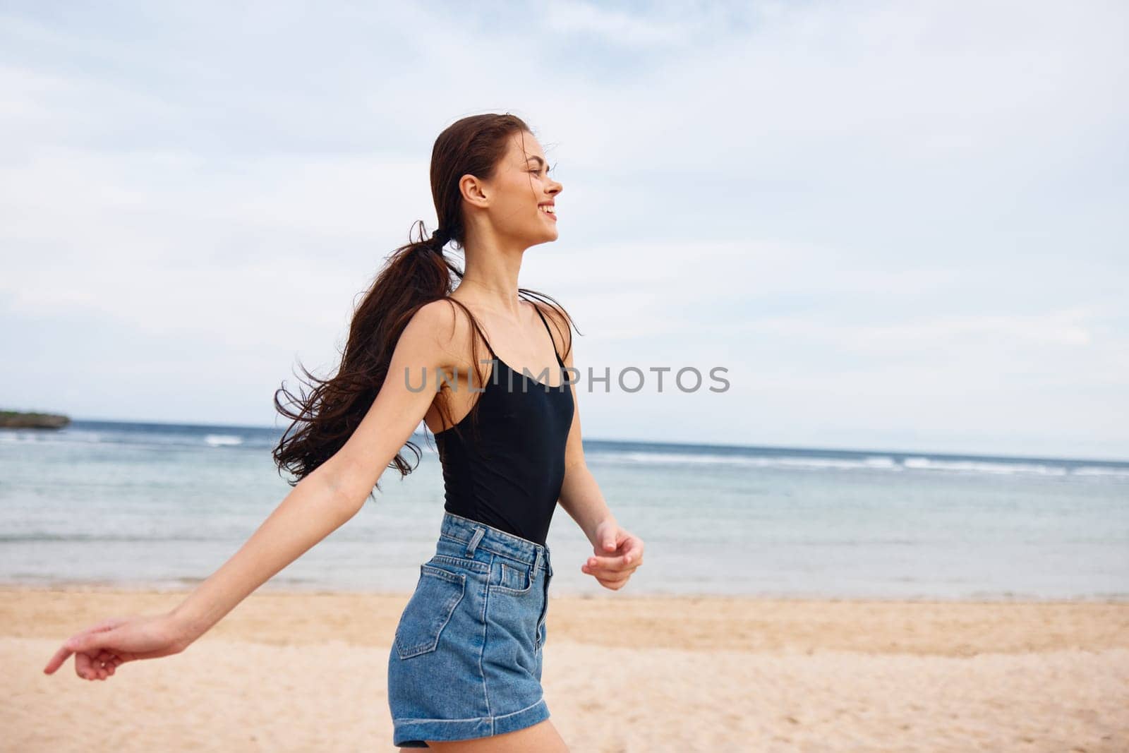 sun woman young summer sea travel beach lifestyle sunset running smile by SHOTPRIME