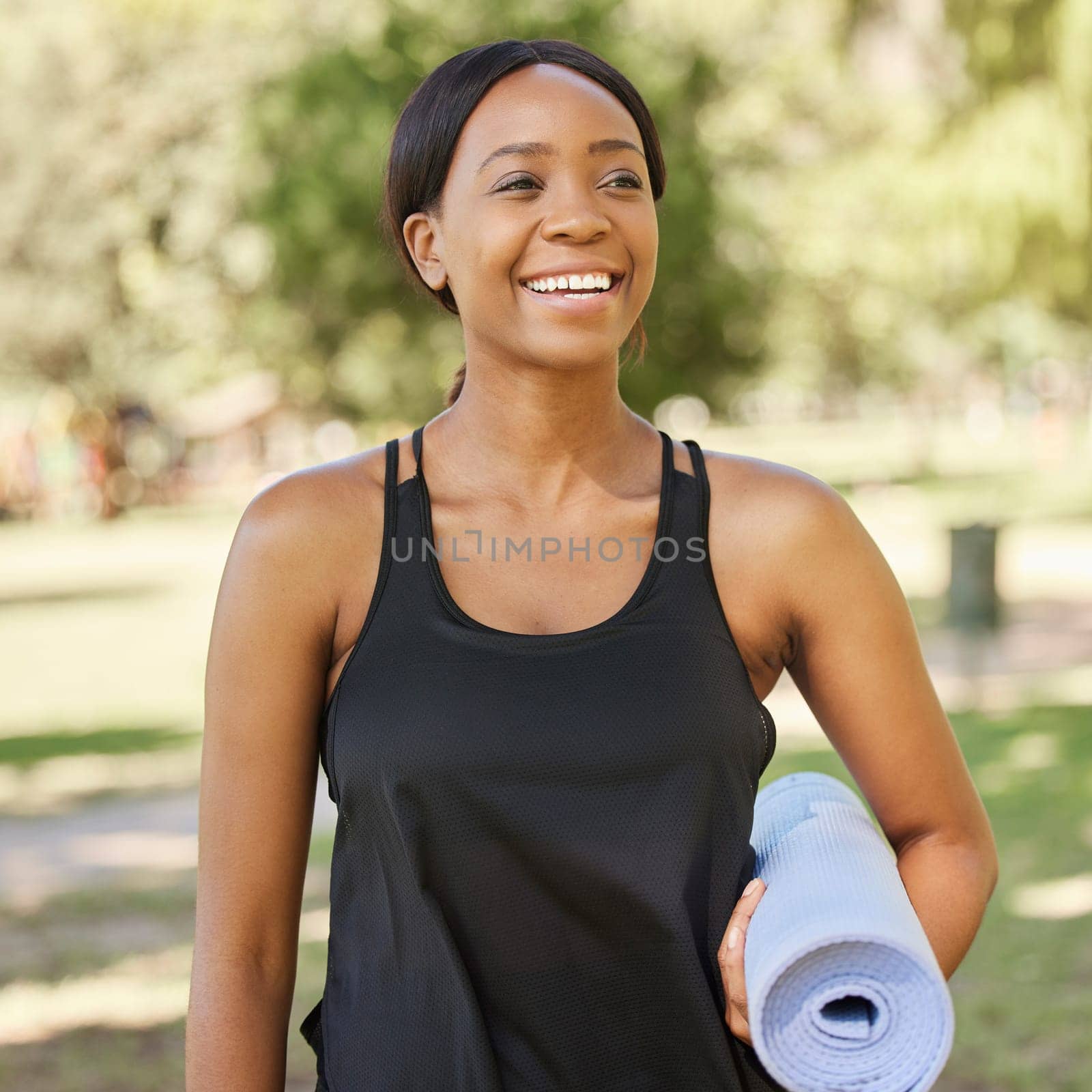 Yoga, exercise mat and mindfulness with a black woman in a park, outdoor for fitness, health or wellness. Mental health, pilates and workout with a female athlete training outside for balance by YuriArcurs