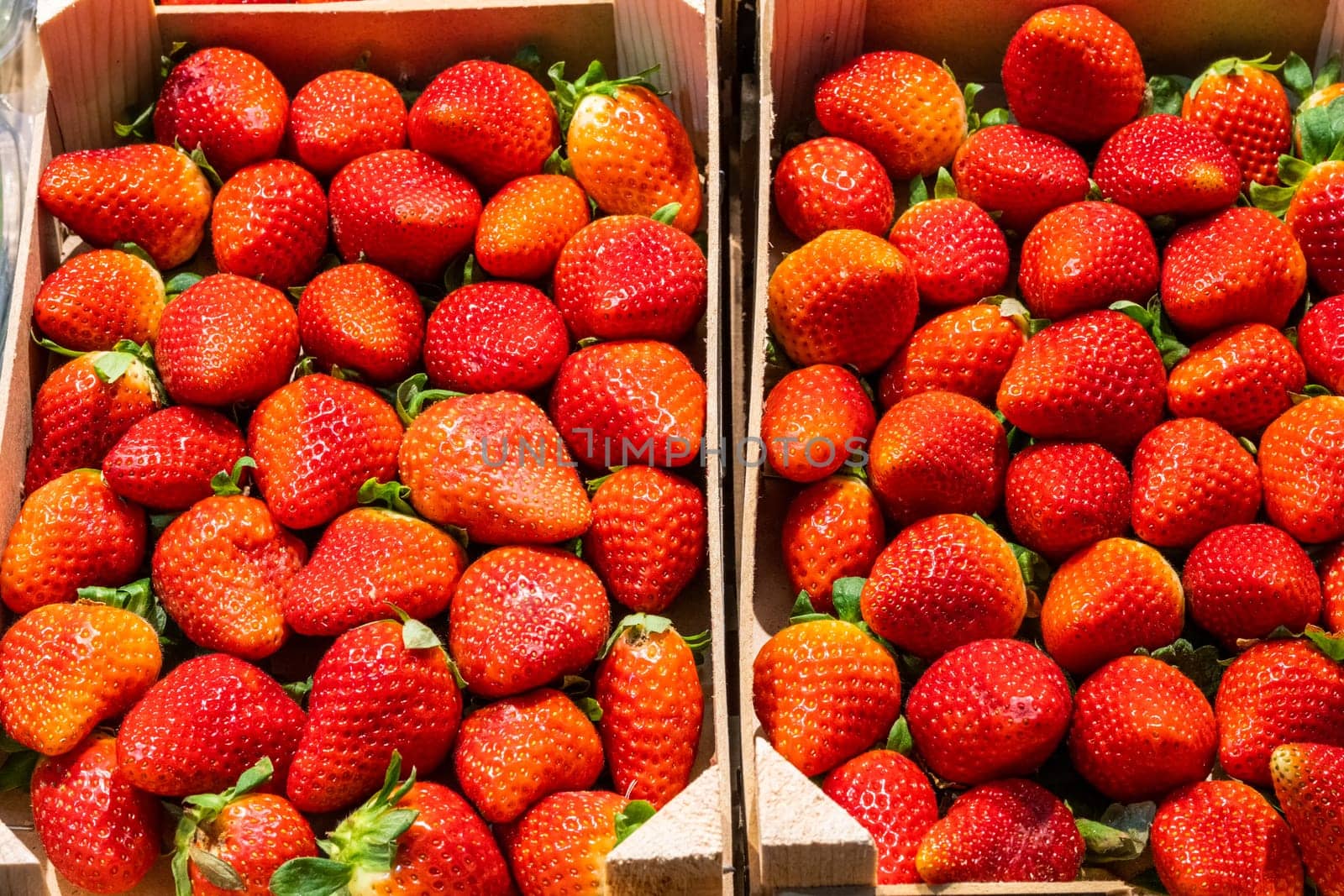 Fresh ripe strawberries for sale at a market