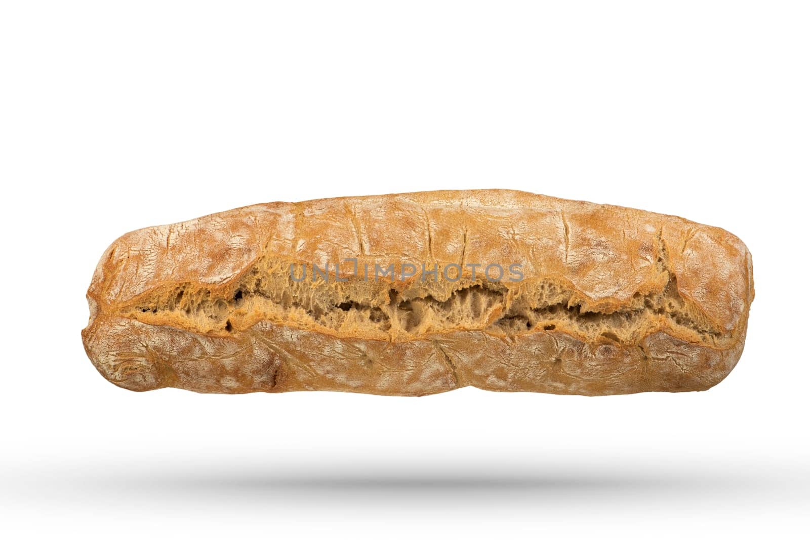 Loaf of Italian fresh ciabatta bread on a white isolated background. Loaf of bread isolate to insert into a design or project. Top view. High quality photo