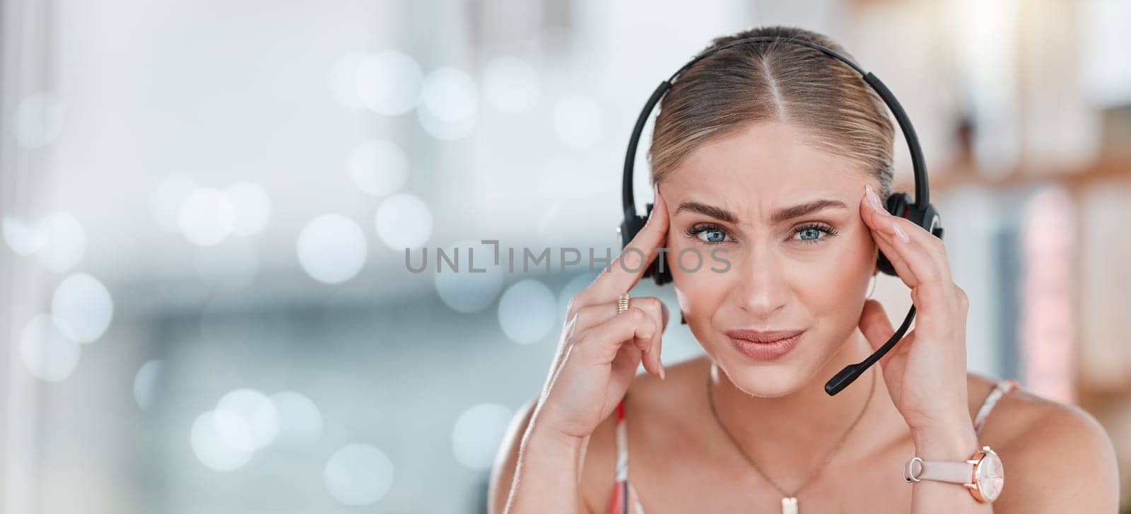 Call center, portrait and woman with headache by space for mockup in office with blurred background. Customer support consultant, agent and stress in workplace with anxiety, mental health and burnout.