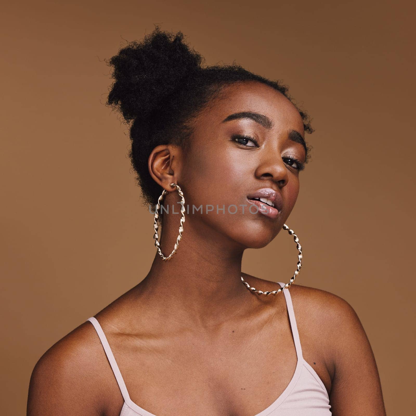 Beauty, black woman and makeup, fashion portrait and skincare, jewelry or accessories on studio background. Face, skin and wellness with cosmetic care, African American model and natural cosmetics by YuriArcurs