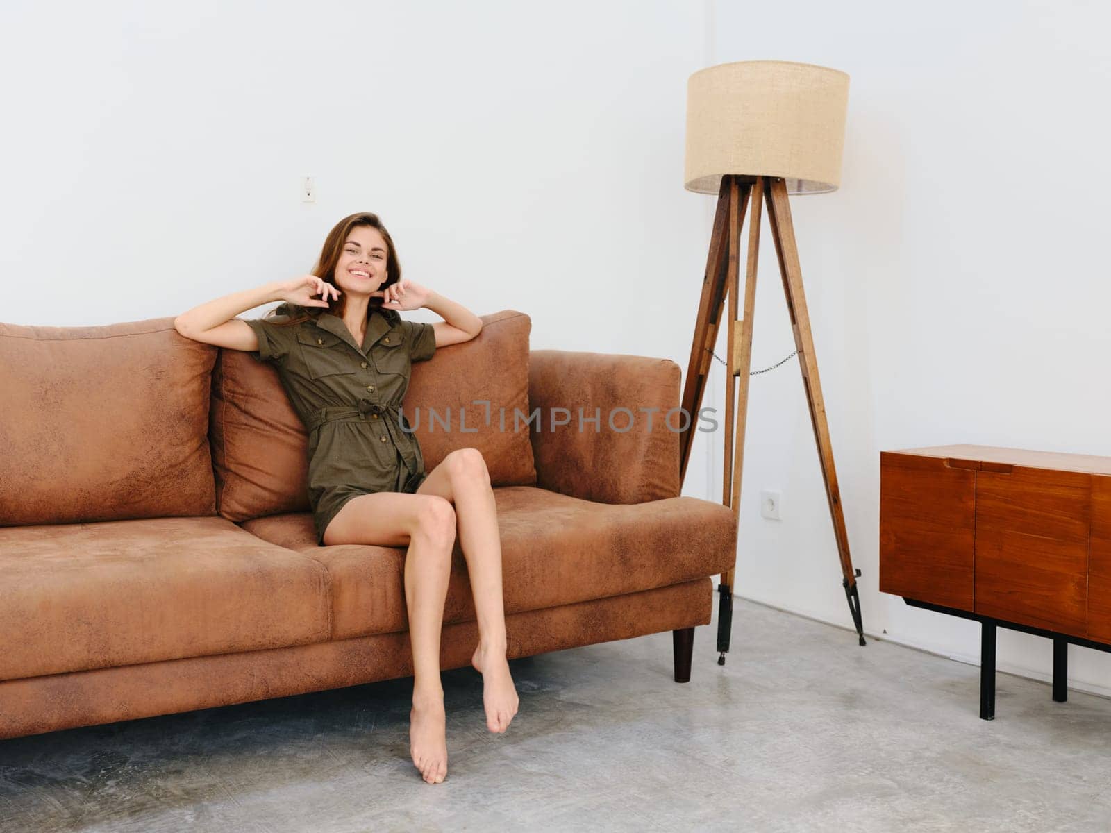 A person sitting in a living room. High quality photo