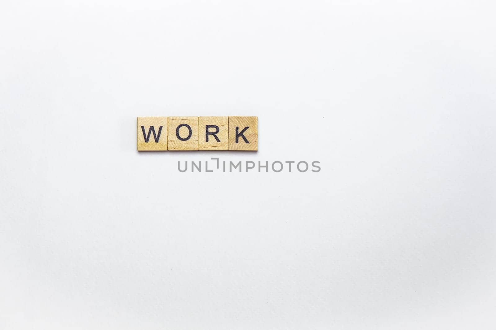 Business and work concept. Inscription with wooden cubes with letters on a white background