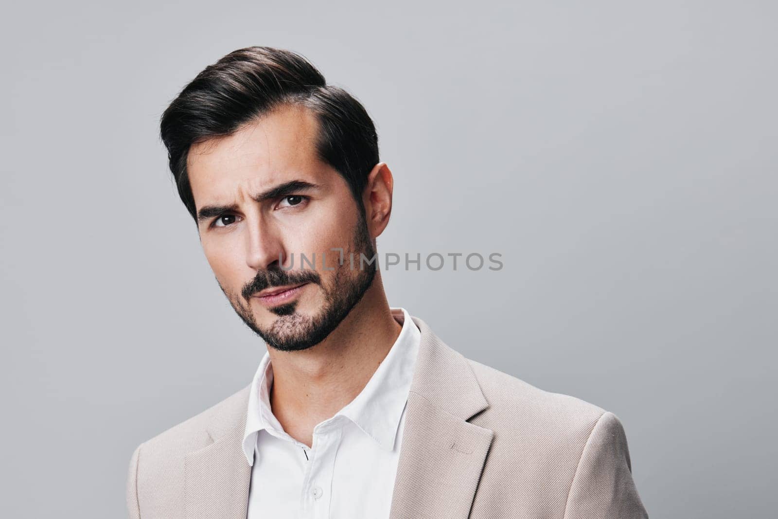 man portrait crossed young executive fashion guy stylish happy tie attractive eyeglass posing occupation business businessman beige suit copyspace handsome smiling