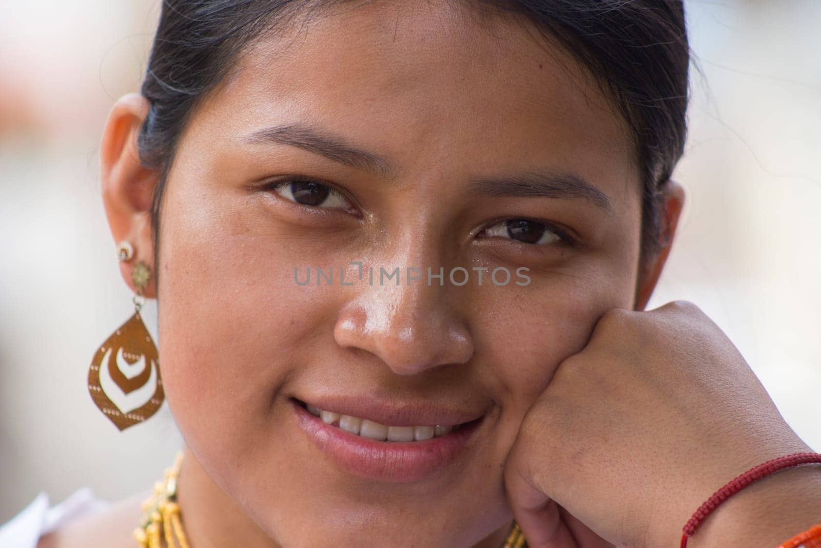 pretty smiling indian girl with golden earrings looking at camera. Ecuadorian natural beauty by Raulmartin