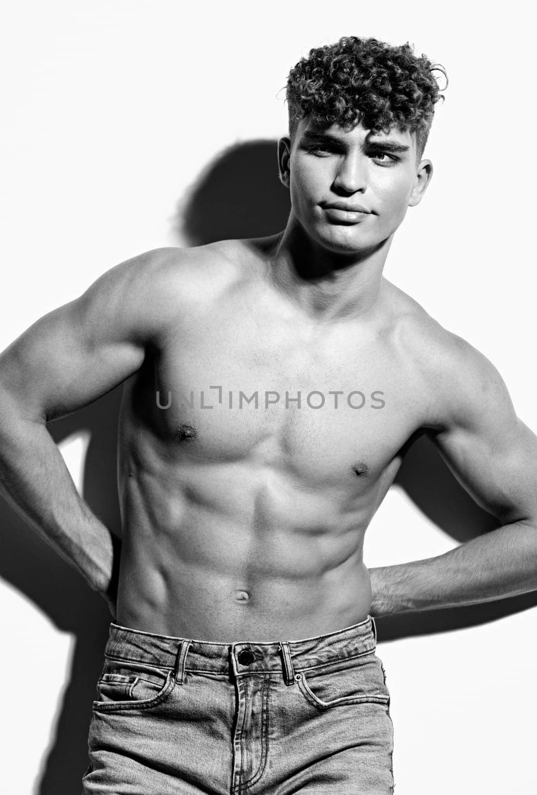 man caucasian adult body beautiful muscular person strength black white jeans attractive shirtless by SHOTPRIME