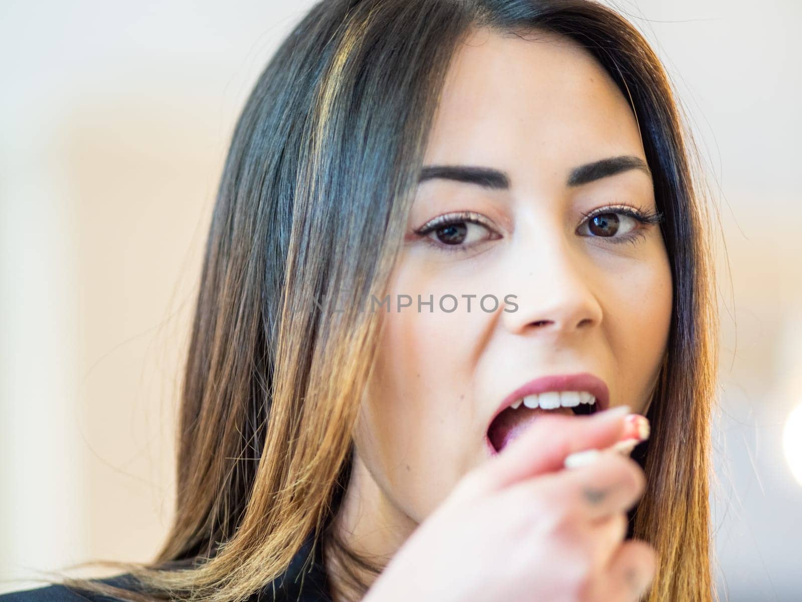 beauty portrait close up mixed race asian race female model with stunning make up over eyes looking confident