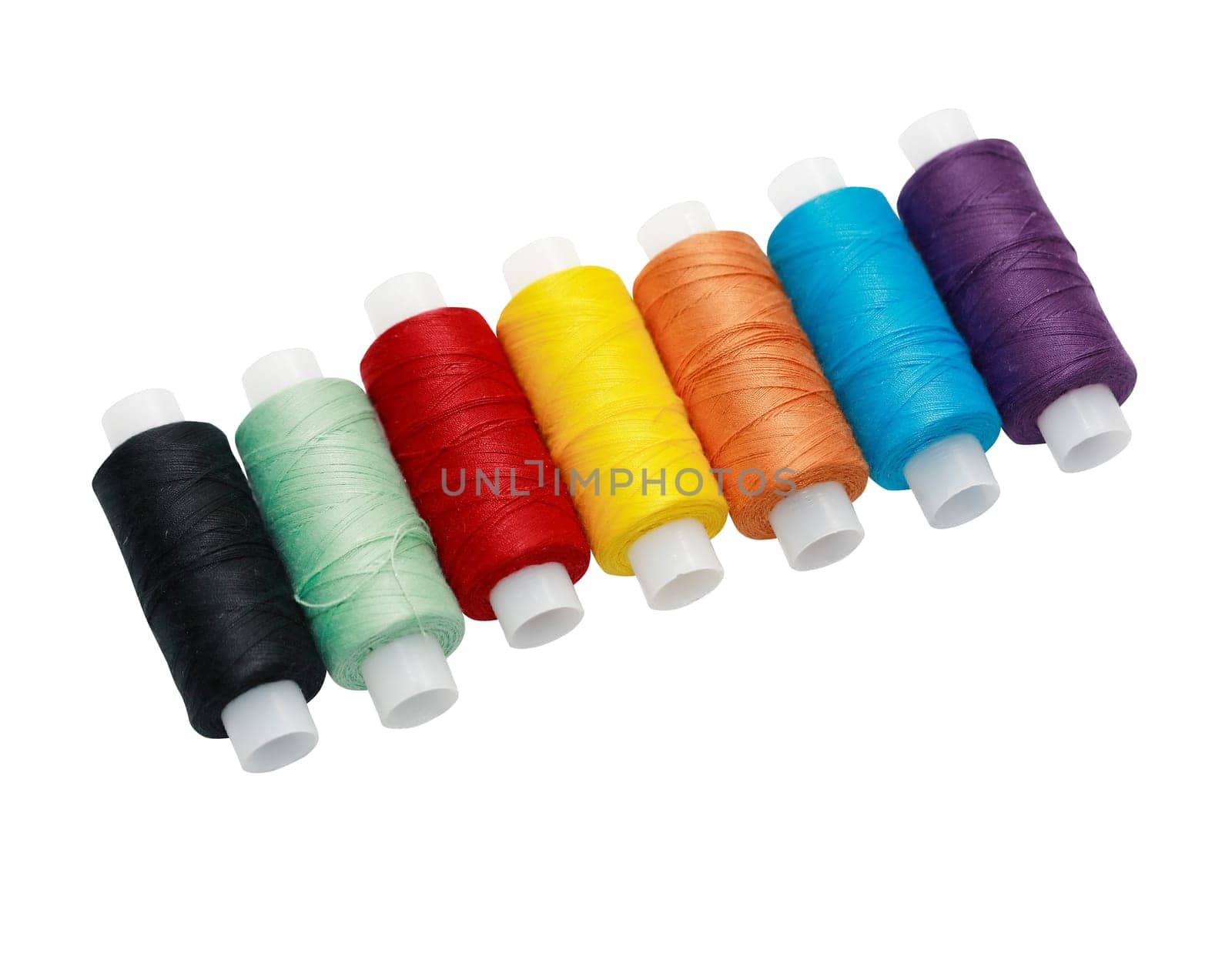 A set of multicolored threads on a white background isolated with clipping path