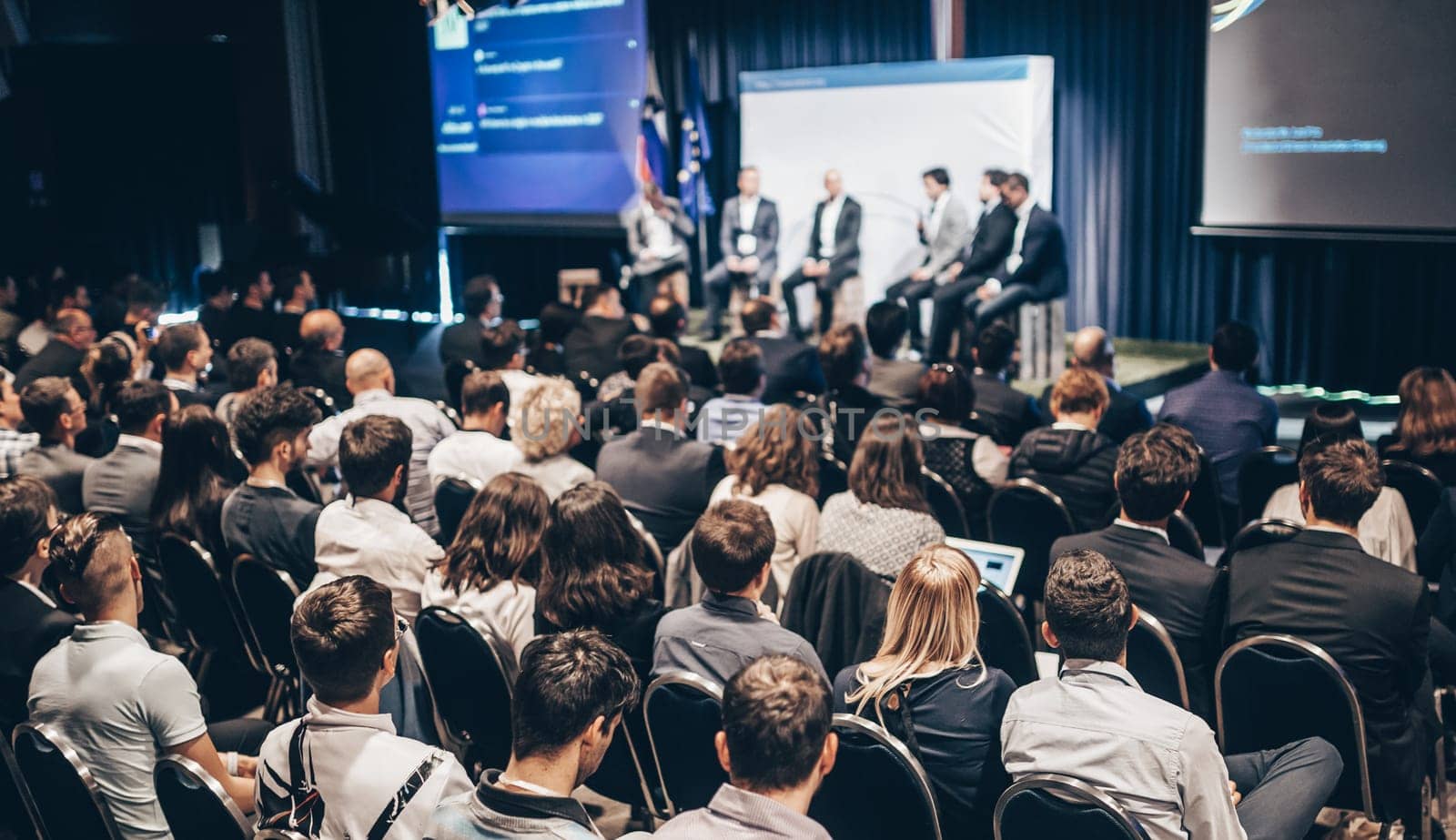 Round table discussion at business conference meeting event.. Audience at the conference hall. Business and entrepreneurship symposium. by kasto