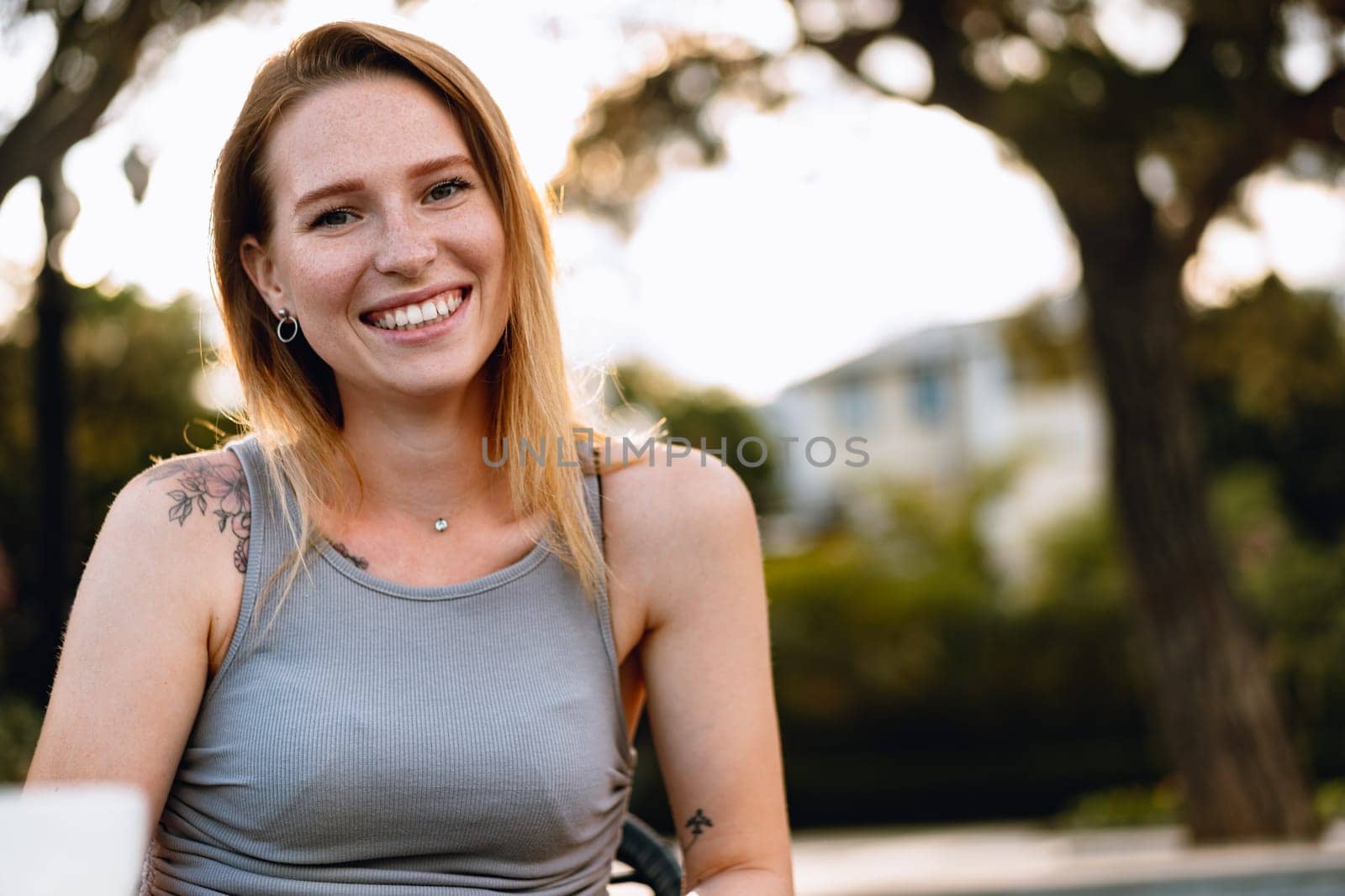 Portrait of a beautiful young woman outdoors by Fabrikasimf