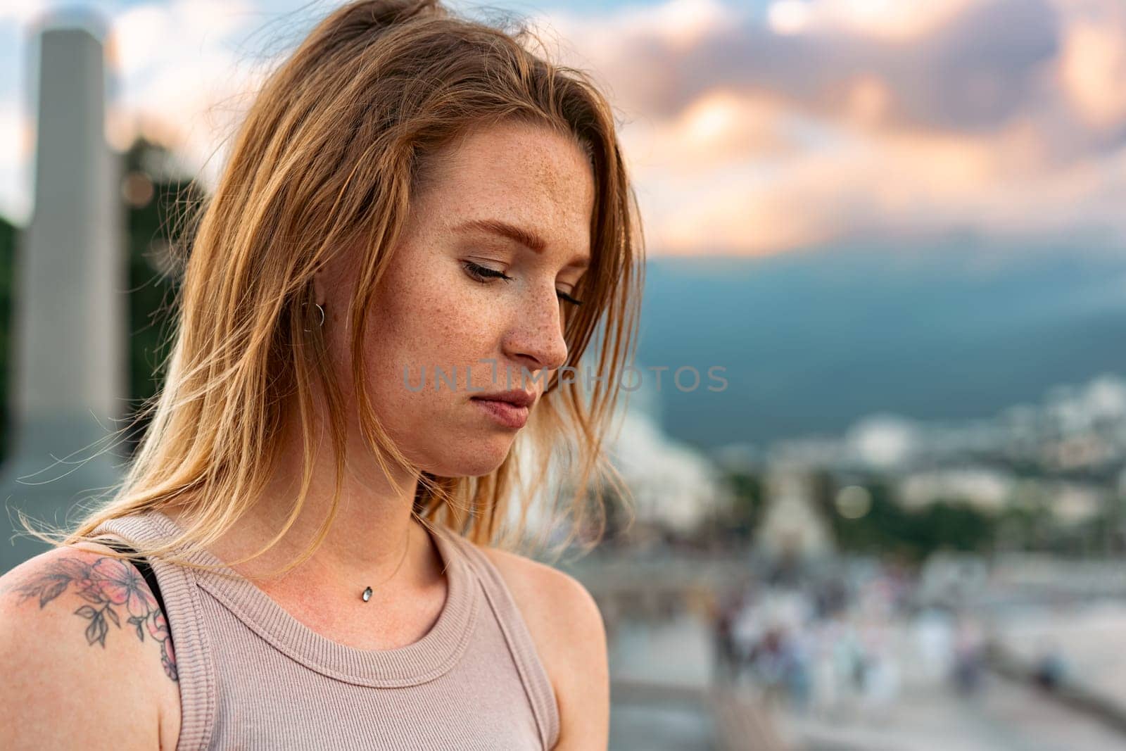 Portrait of a beautiful young woman outdoors in the city