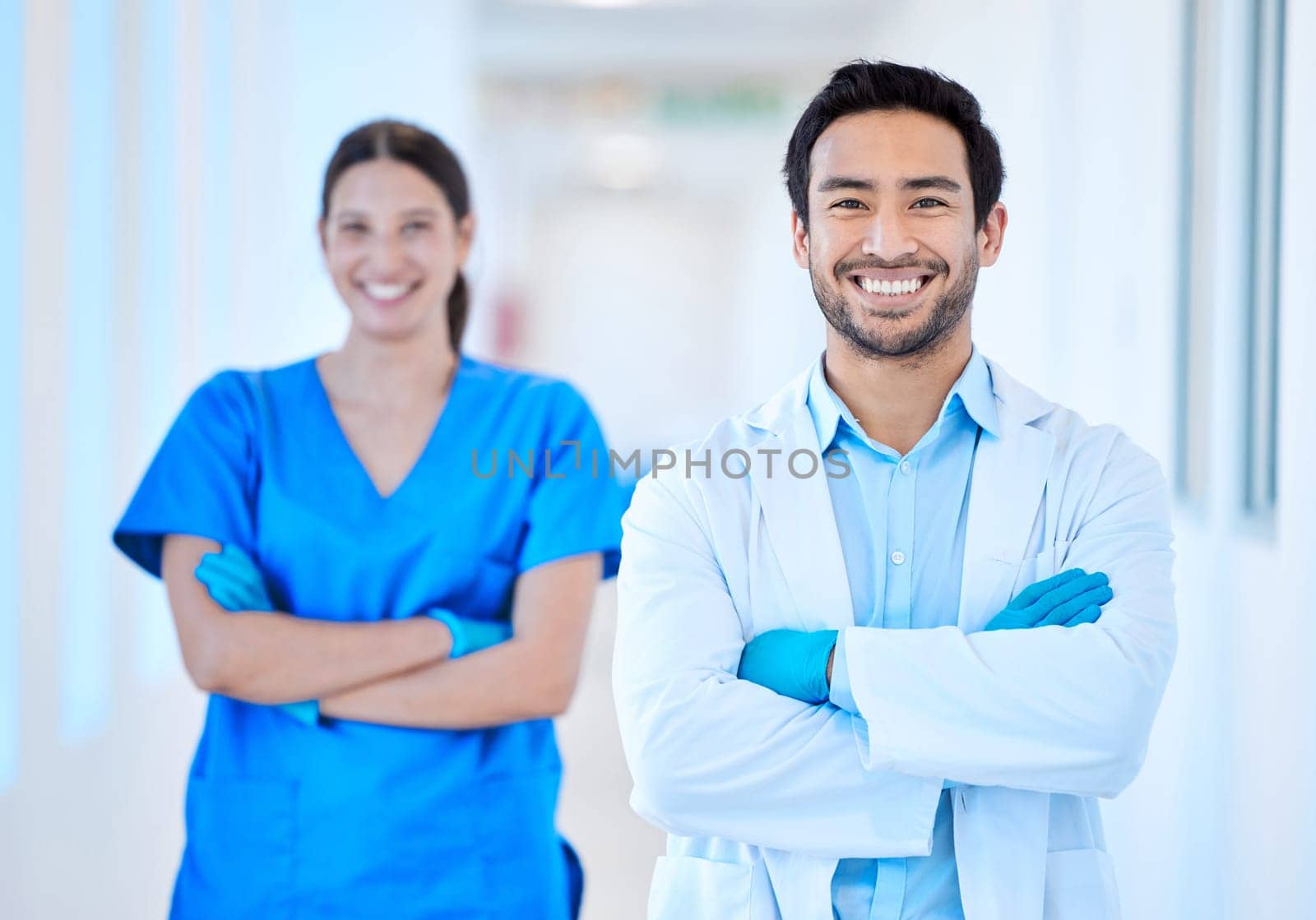 Dentist, portrait and arms crossed with woman assistant and motivation at dental office and clinic. Success, happy worker and healthcare professional in medical workplace for orthodontist consulting.