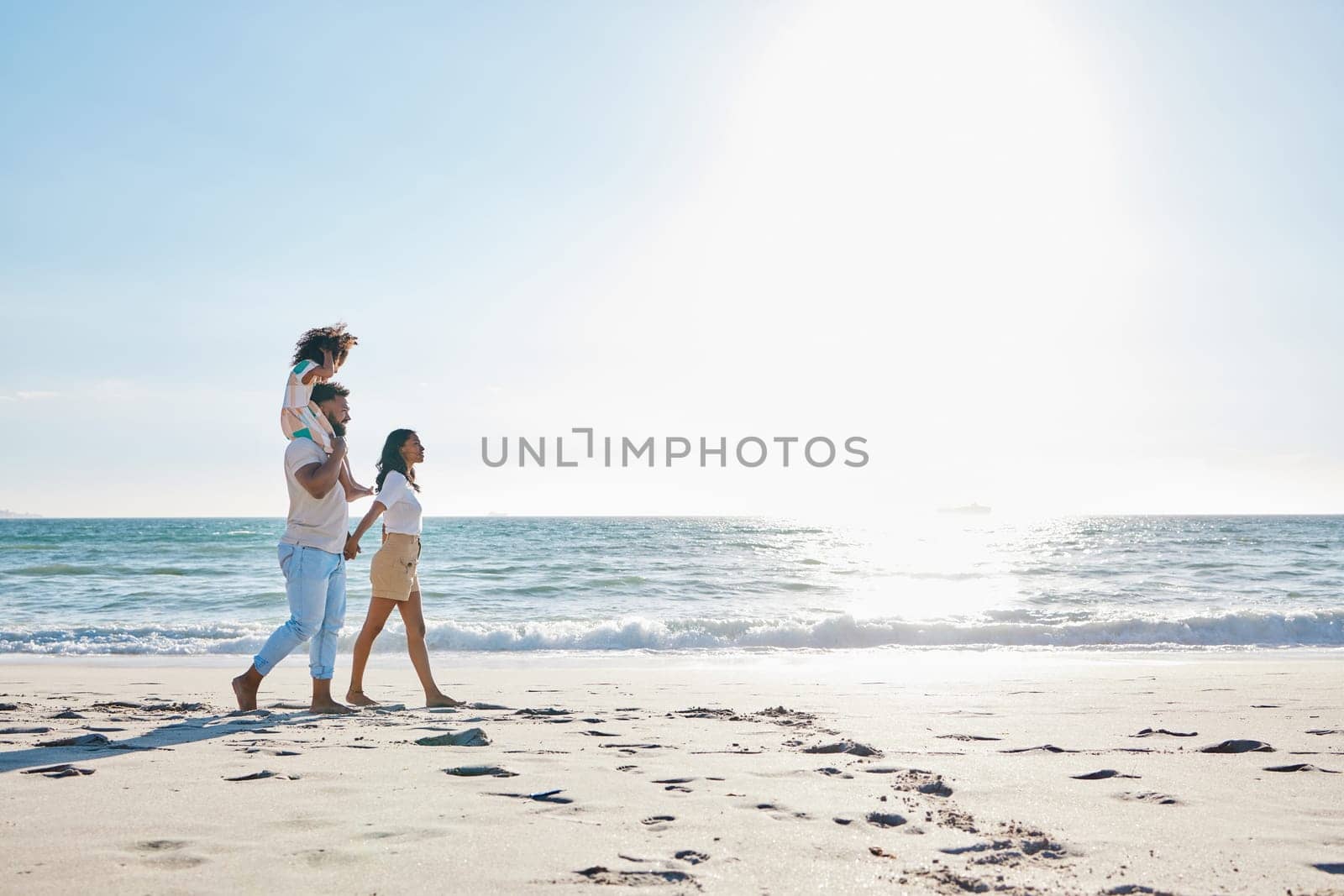 Walking, beach and family on holiday, summer and stress relief with happiness, relax and weekend break. Parents, mother and father with female kid, tropical island and seaside vacation for travelling by YuriArcurs