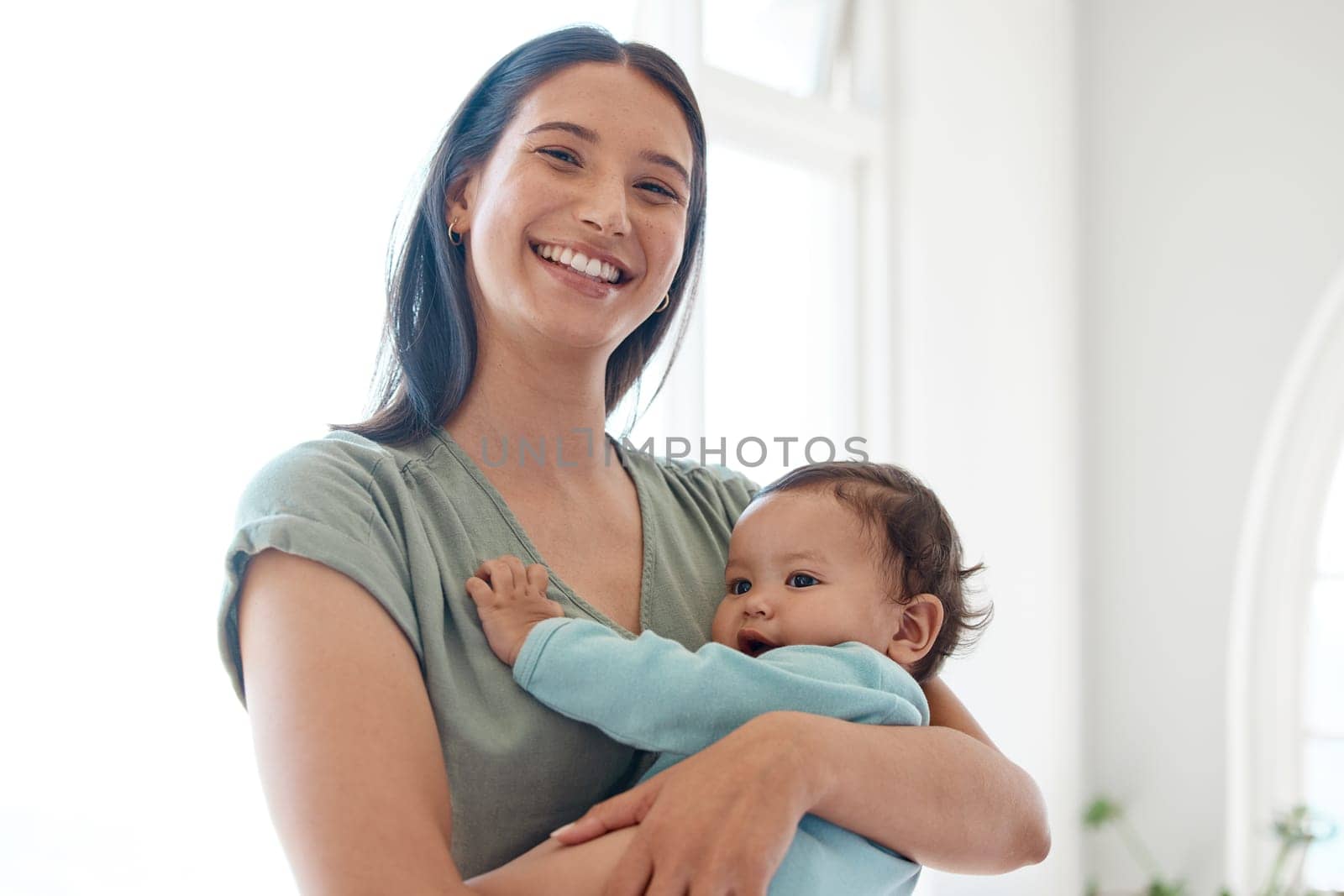 Mother, baby and happy portrait in home for love, care and quality time together for trust, growth and development. Mom, infant and holding newborn girl, kid and support of happiness in nursery room by YuriArcurs