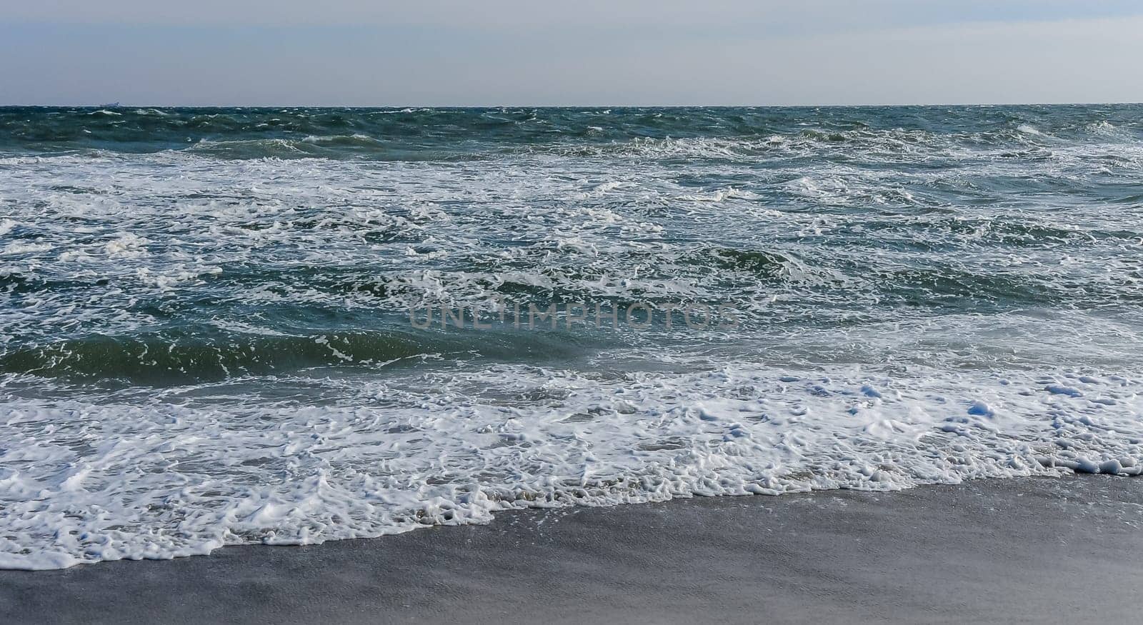 Stormy sea, waves and white foam on the surface, Black Sea