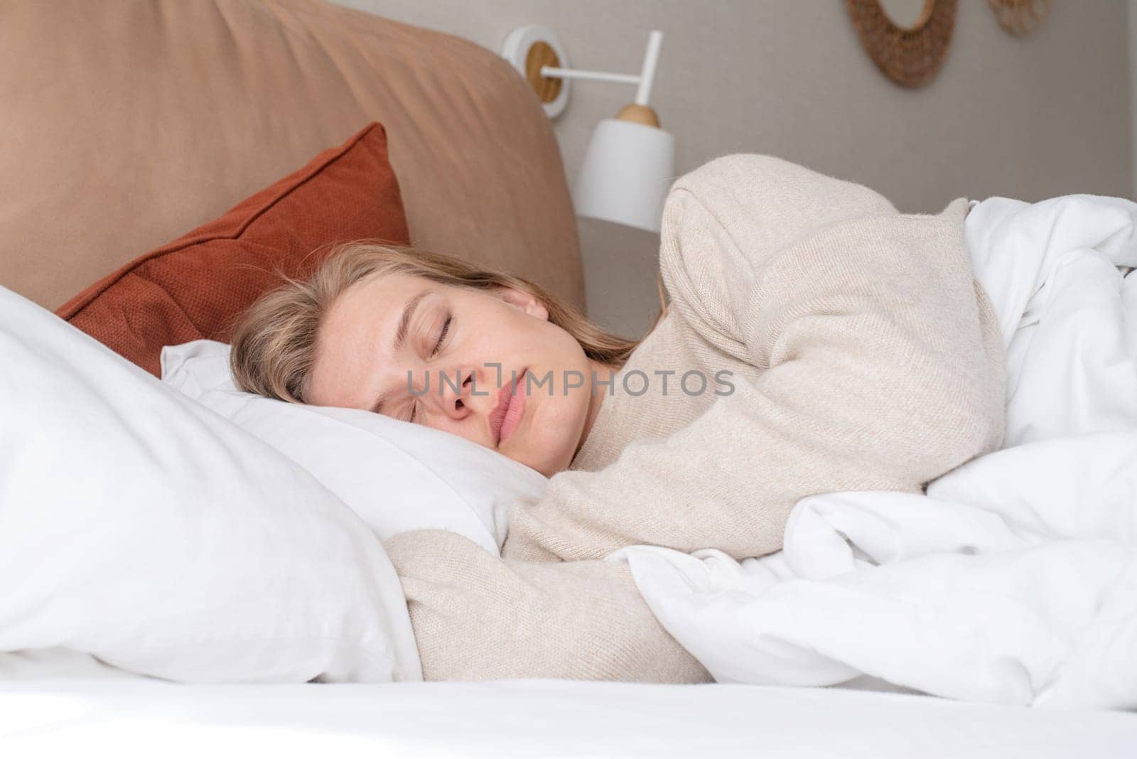 Woman sleeping at bed at home by Desperada