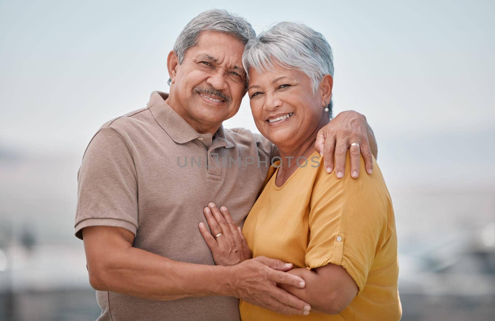 Happy, love and portrait of a senior couple in retirement, bonding and embracing in nature. Happiness, smile and elderly man and woman from Puerto Rico hugging with care, romance and joy outdoors. by YuriArcurs