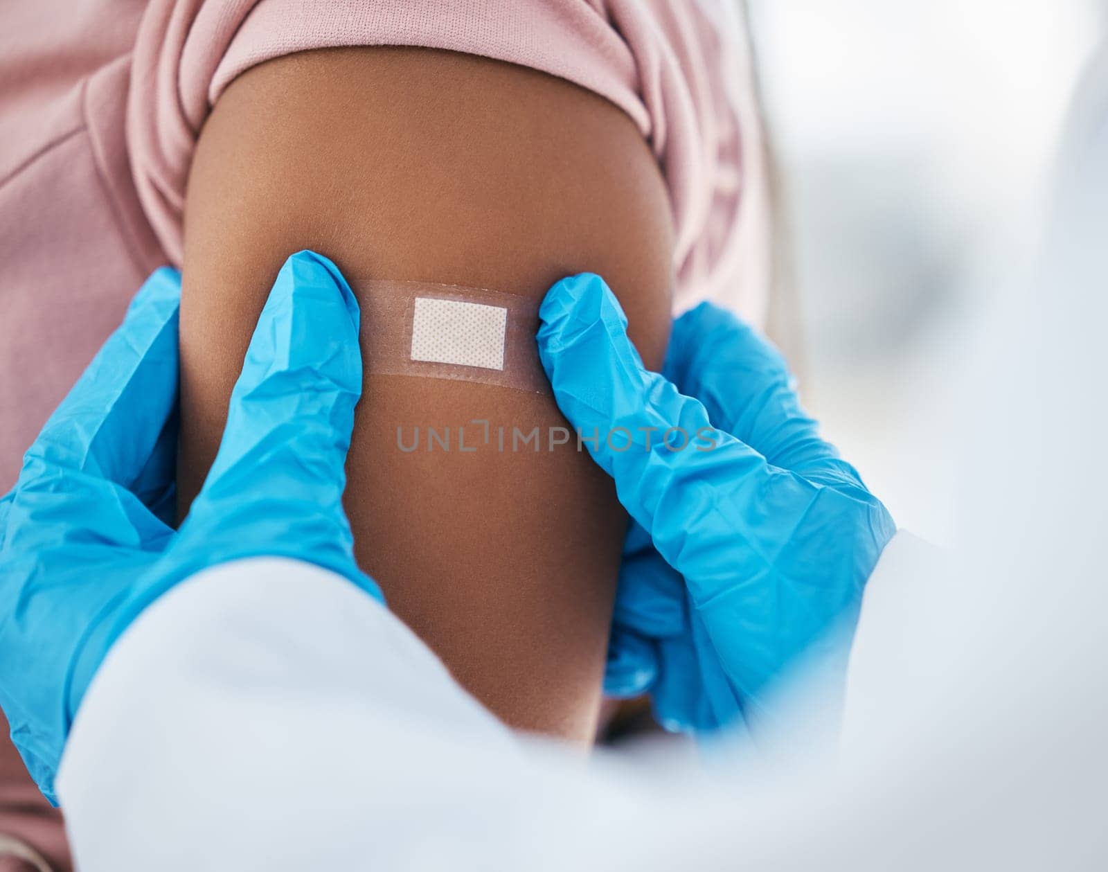Plaster on patient arm from doctor, vaccine and flu shot, healthcare and medical insurance for hpv, covid 19 and safety in hospital. Nurse hands bandaid, corona virus immunity and consulting service.