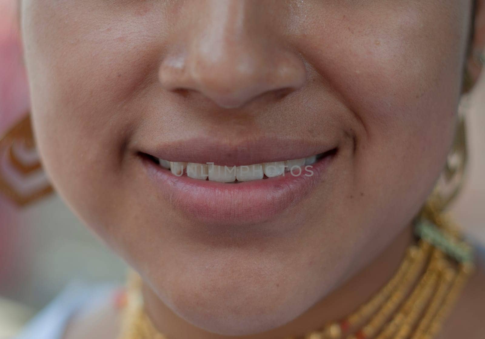 close-up of the face, the lips of a pretty indigenous woman. High quality photo