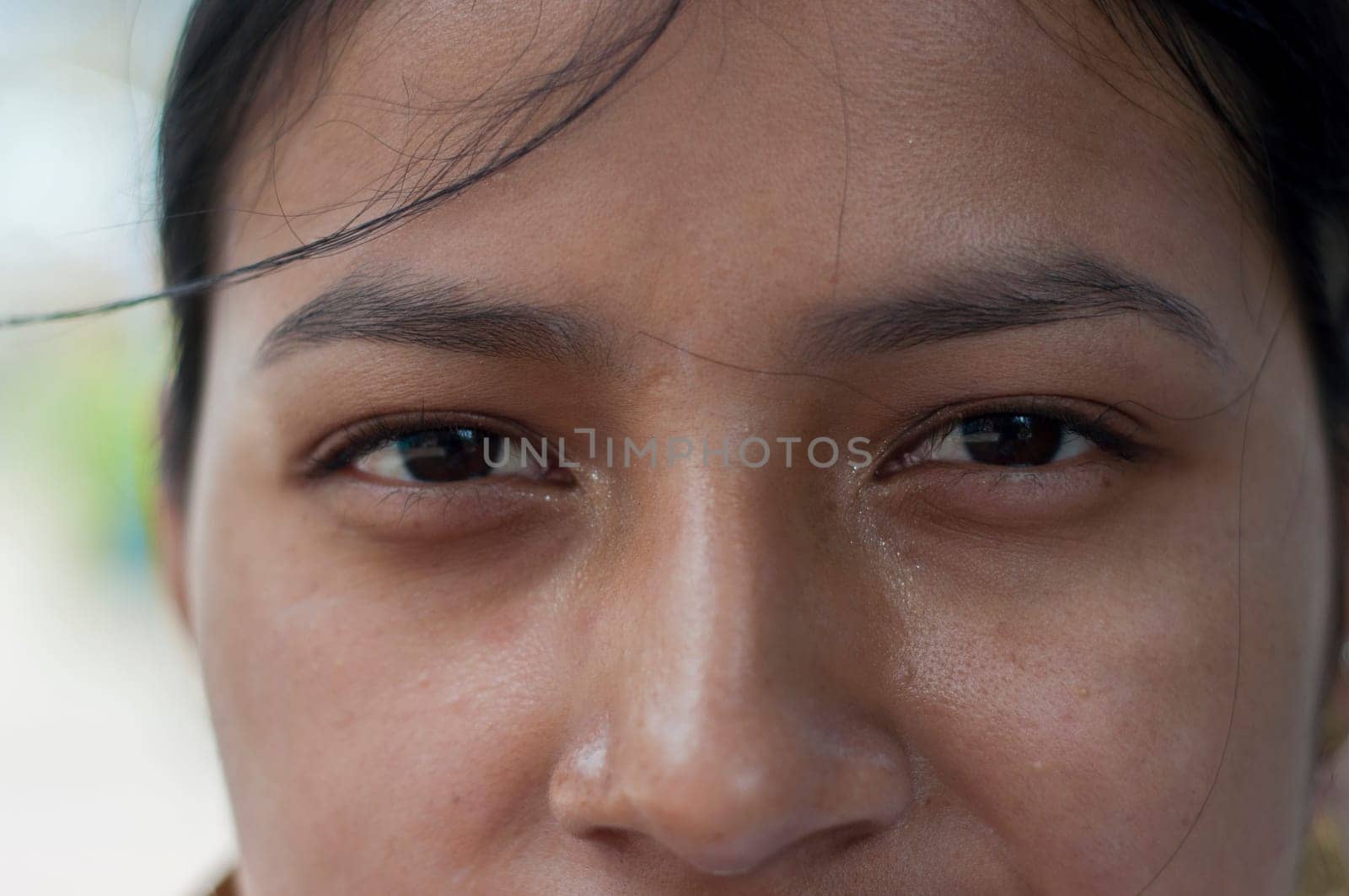 Detail shot of beautiful eyes of a beautiful indigenous woman from the Ecuadorian Amazon. High quality photo