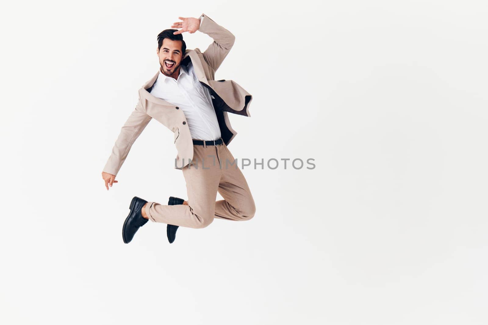 adult man model professional happy isolated idea businessman business up standing male victory running suit eyeglass beige winner person smiling shirt