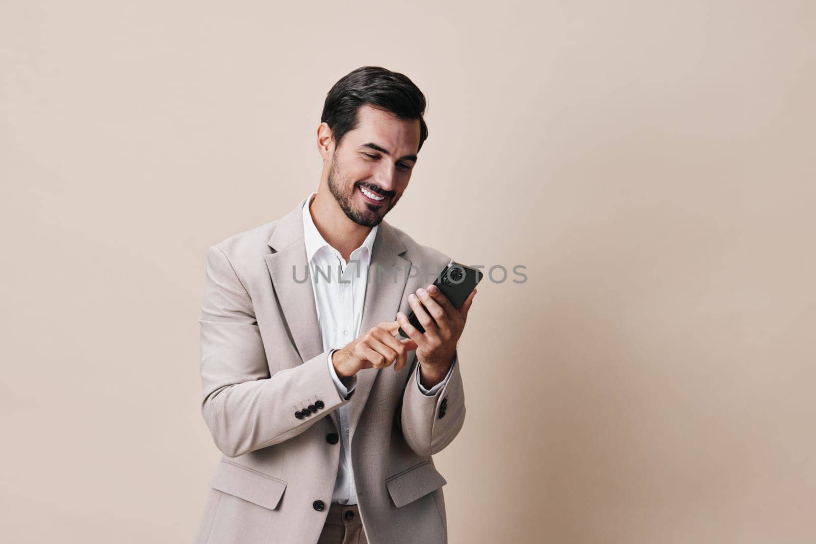 man phone success smile technology call person portrait copy blogger communication isolated hold smartphone male happy application guy business space suit businessman