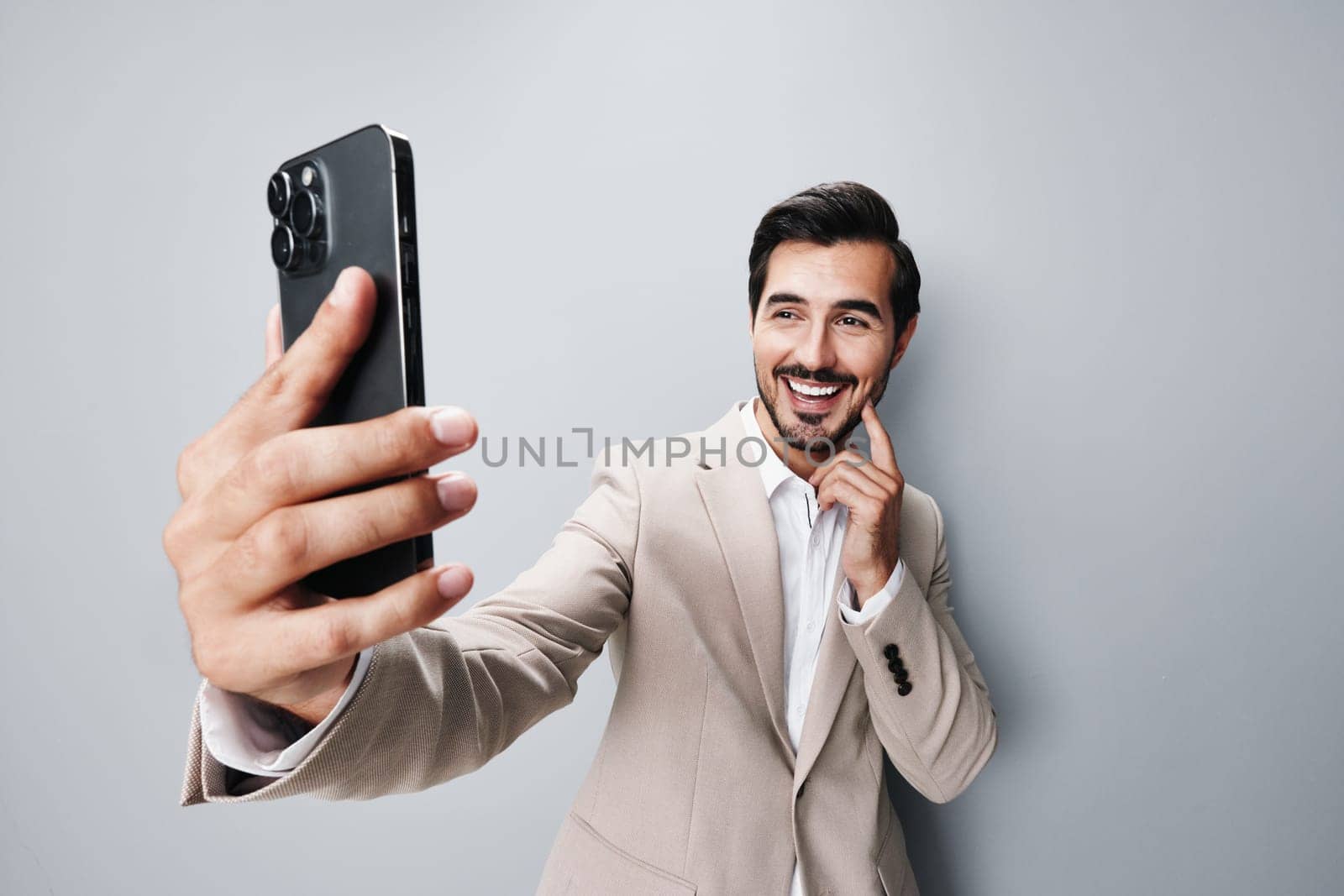 man suit happy call portrait phone business smile smartphone hold young by SHOTPRIME