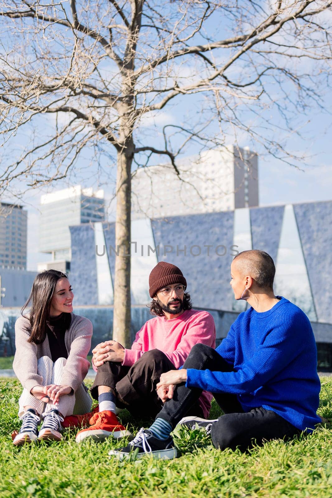 three friends enjoying in a sunny day at the park by raulmelldo