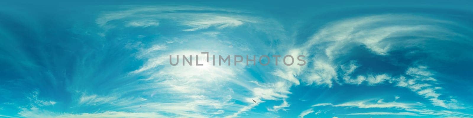 Bright sunset sky panorama with Cirrus clouds. Seamless hdr spherical equirectangular 360 panorama. Sky dome or zenith for 3D visualization, game and sky replacement for aerial drone 360 panoramas.