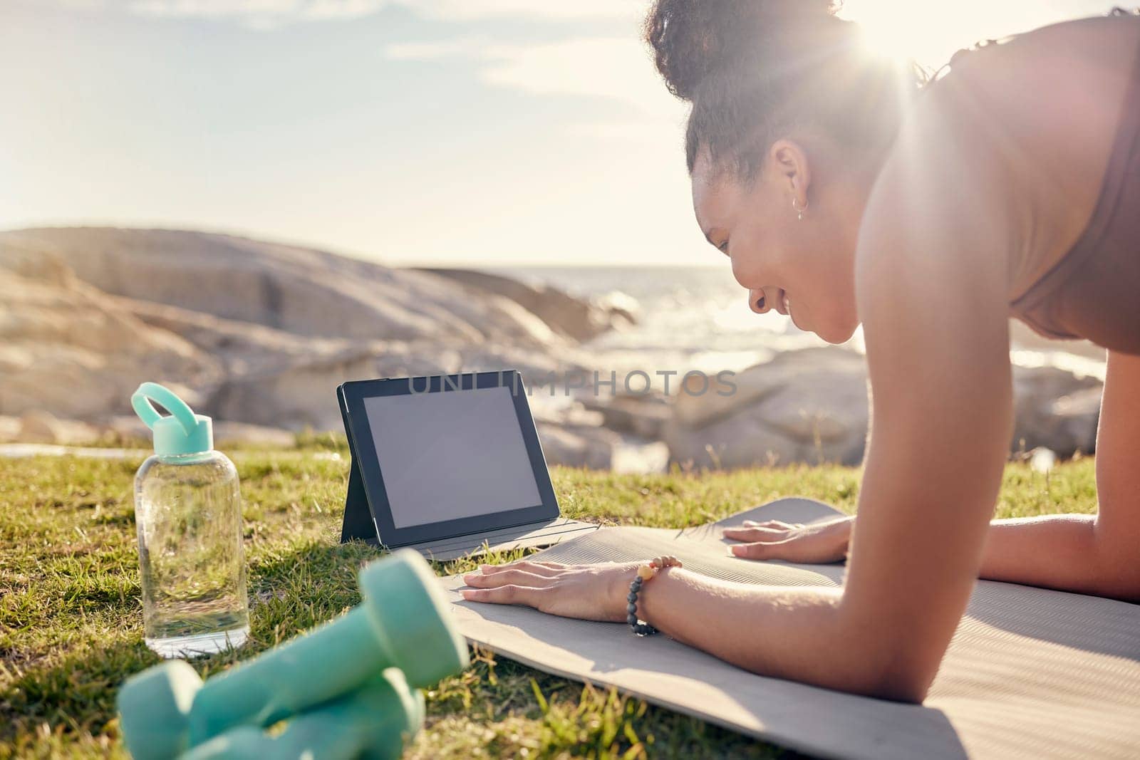 Yoga, nature and tablet with woman on fitness online class, live streaming or video learning mockup in summer. Pilates, stretching and workout sports girl in a park with exercise gear and tech screen.