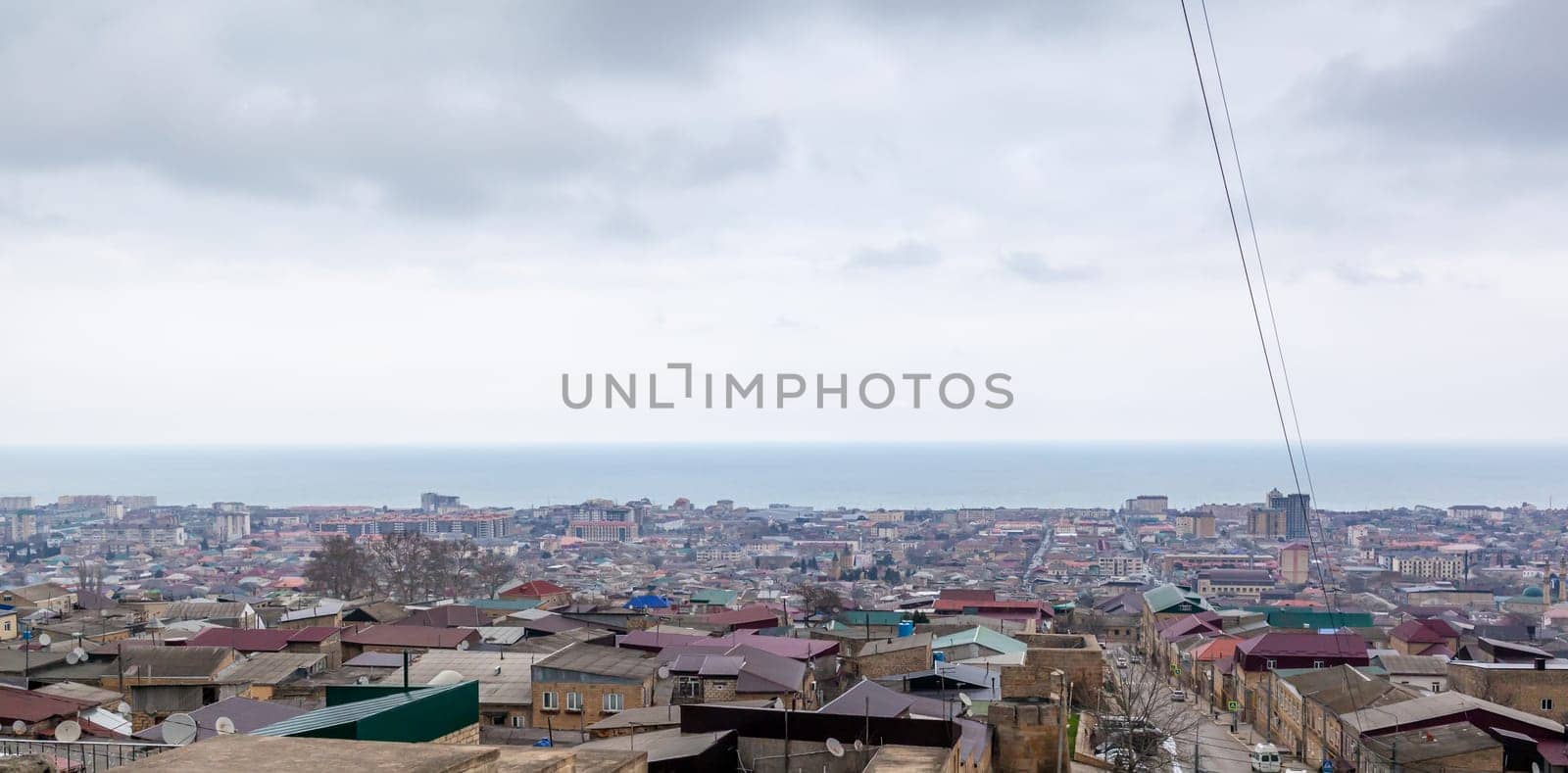 Old town along the blue sea, top view. The ancient city of Derbent by AnatoliiFoto