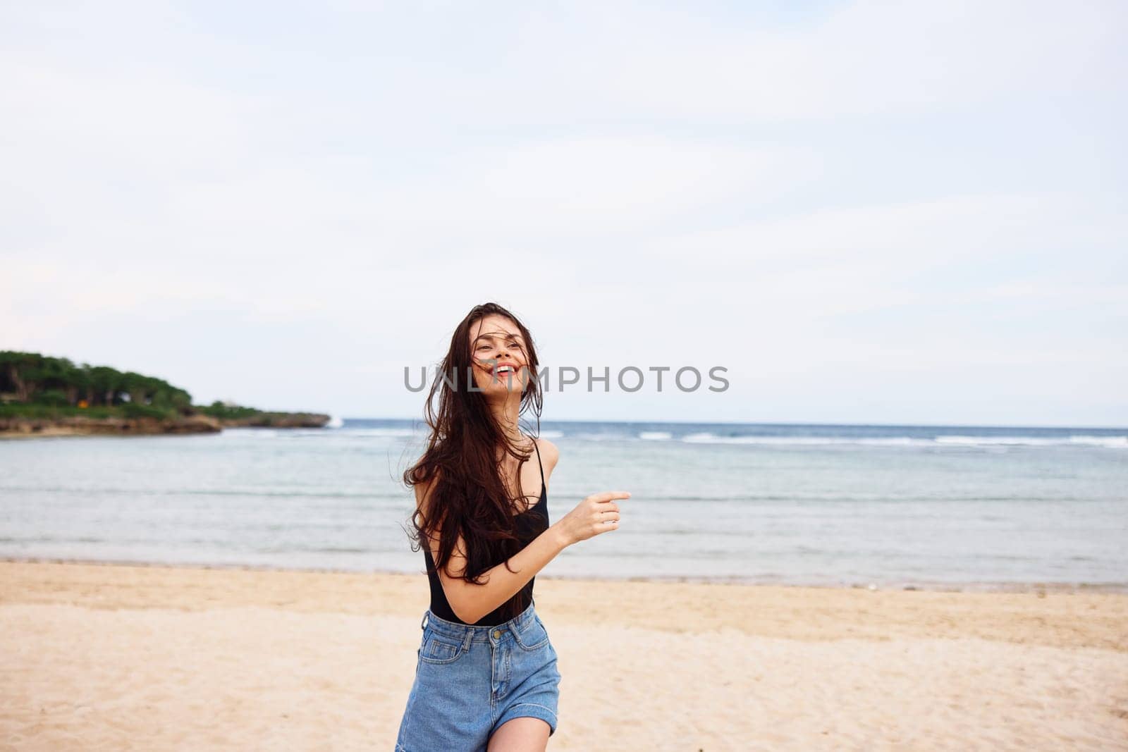 space woman beach female young copy relax smile hair running ocean sea summer body positive sunset lifestyle fun nature shore travel smiling