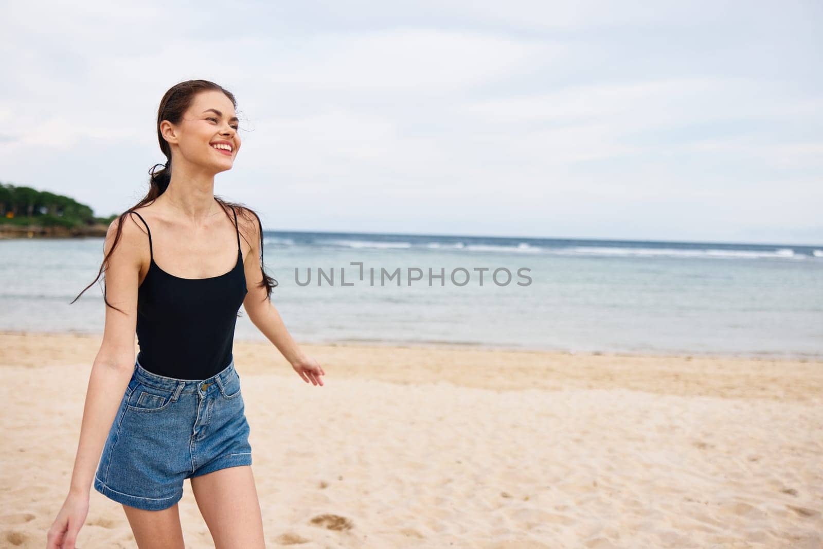 woman copy young sand girl beach ocean space running lifestyle sexy nature summer sea smile relax freedom sunset travel tan beautiful hair