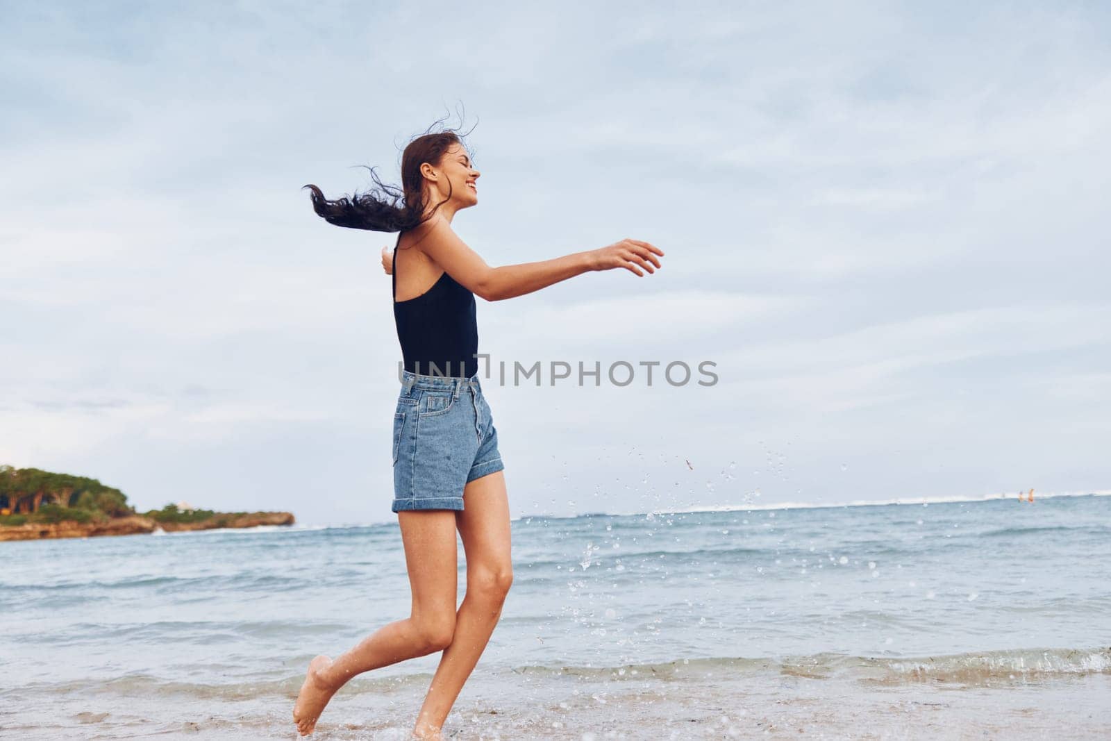 woman smile hair young sunset running travel sea summer lifestyle beach by SHOTPRIME