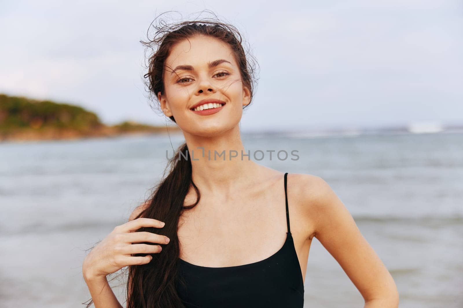 woman vacation sunlight smile relax beach sunset coast carefree sky tropical sand walking young lifestyle summer ocean running travel person sea