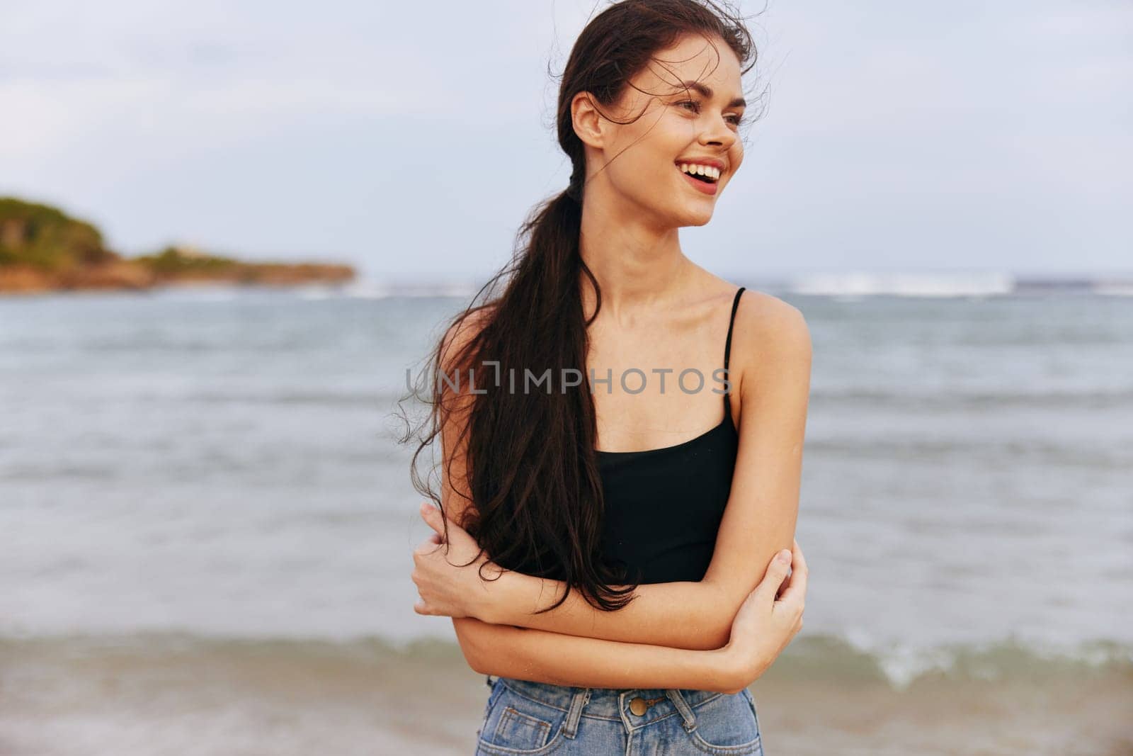 peaceful woman vacation leisure jean summer copy-space caucasian beach sunset lifestyle sand tropical adult smile beautiful travel nature sea smiling ocean