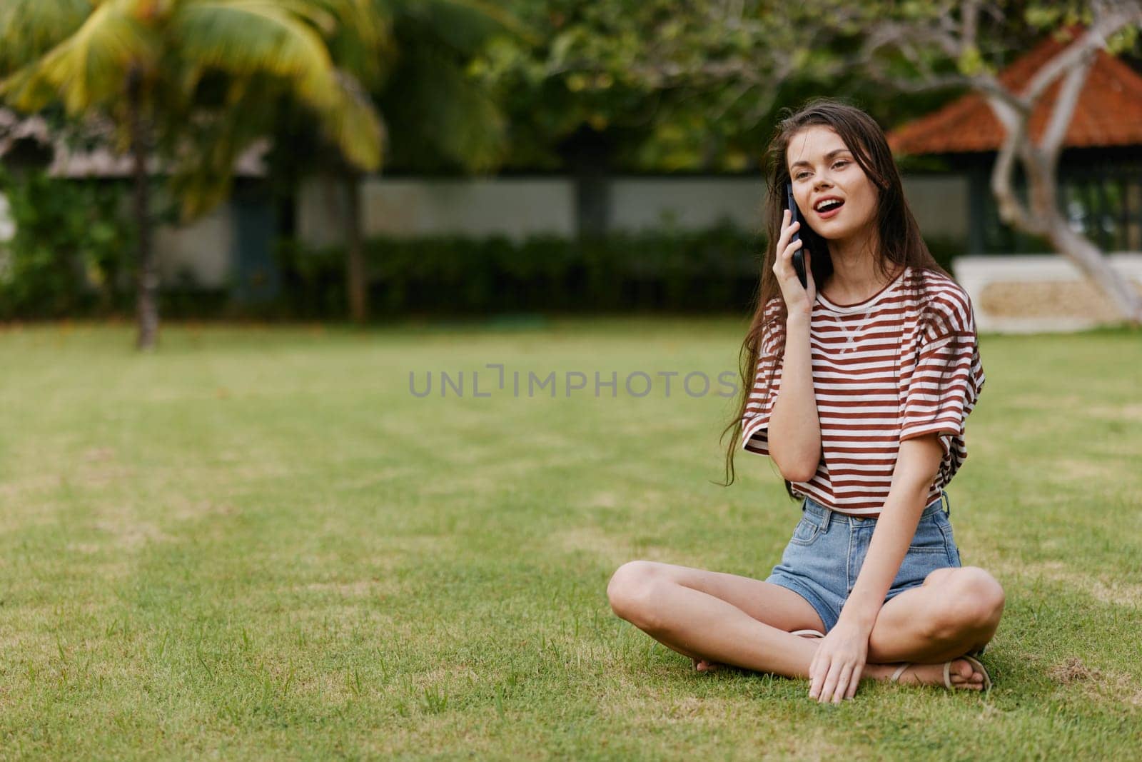 woman grass walk park nature happy phone tree lifestyle smiling palm blogger by SHOTPRIME