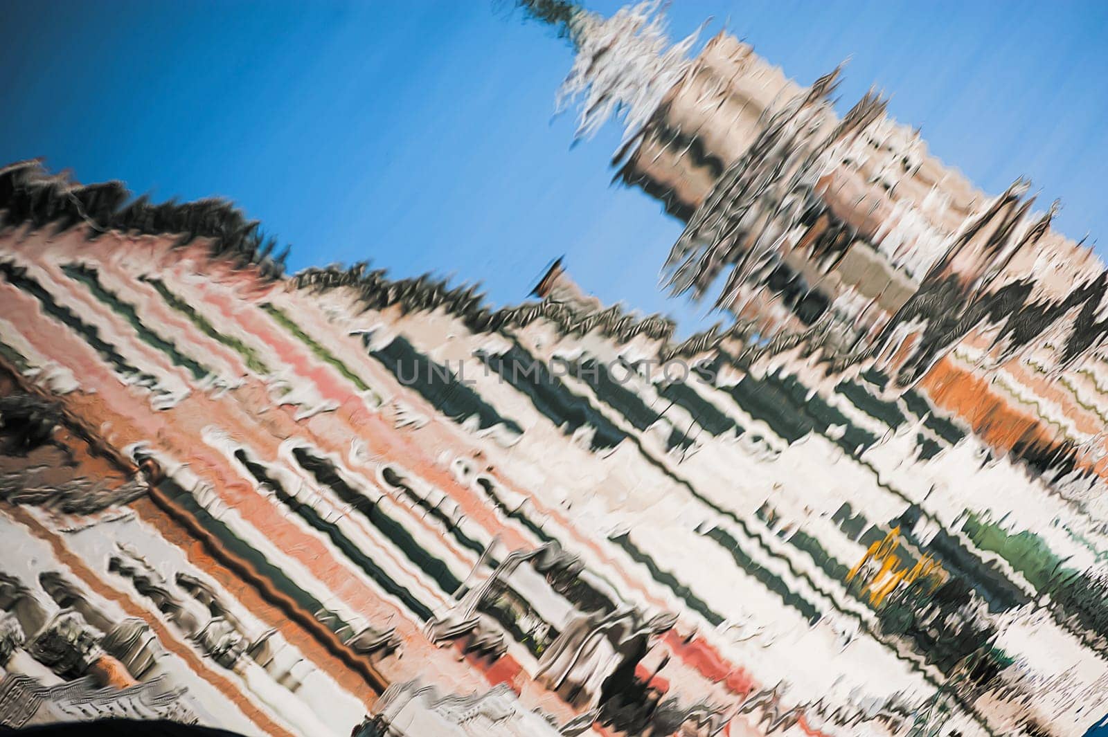 The houses of Venice reflected on the water of a canal