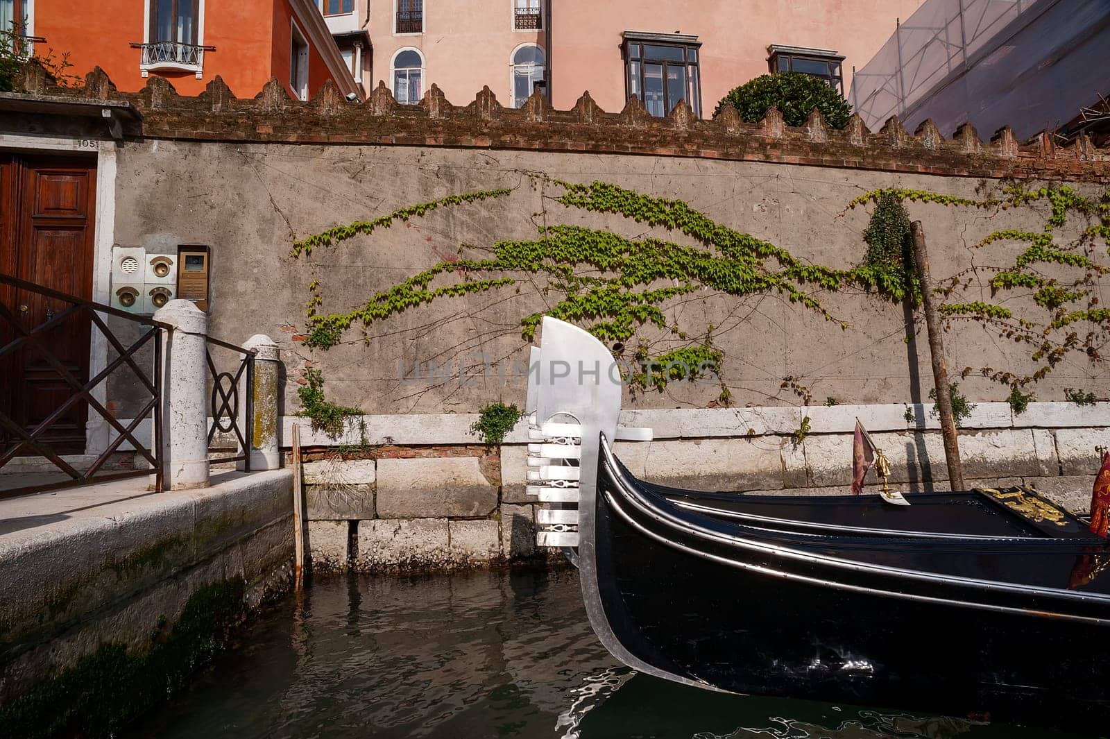 The metal bow (ferro) of the gondola of venice by Giamplume