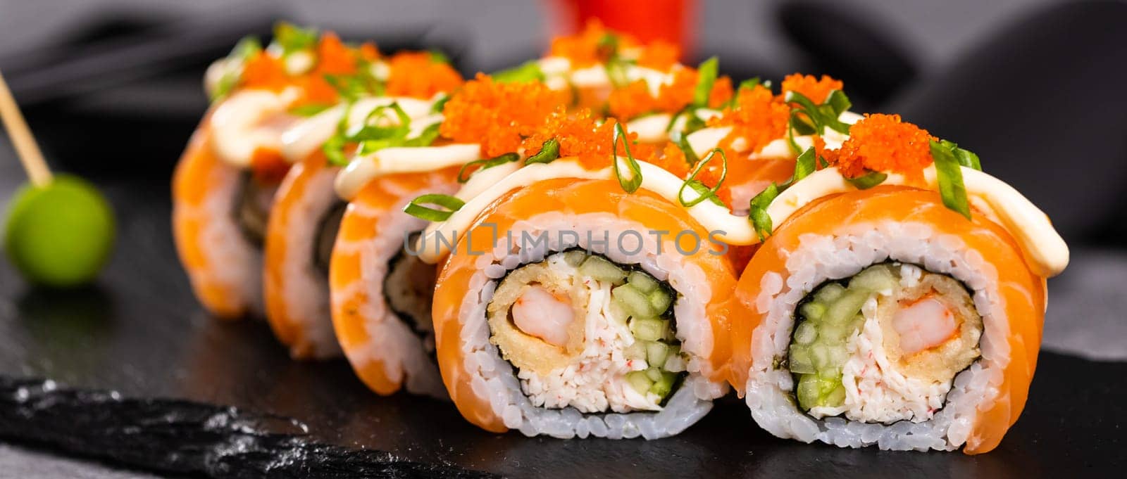 Sushi roll on dark background banner. Japanese and asian food concept by Satura86